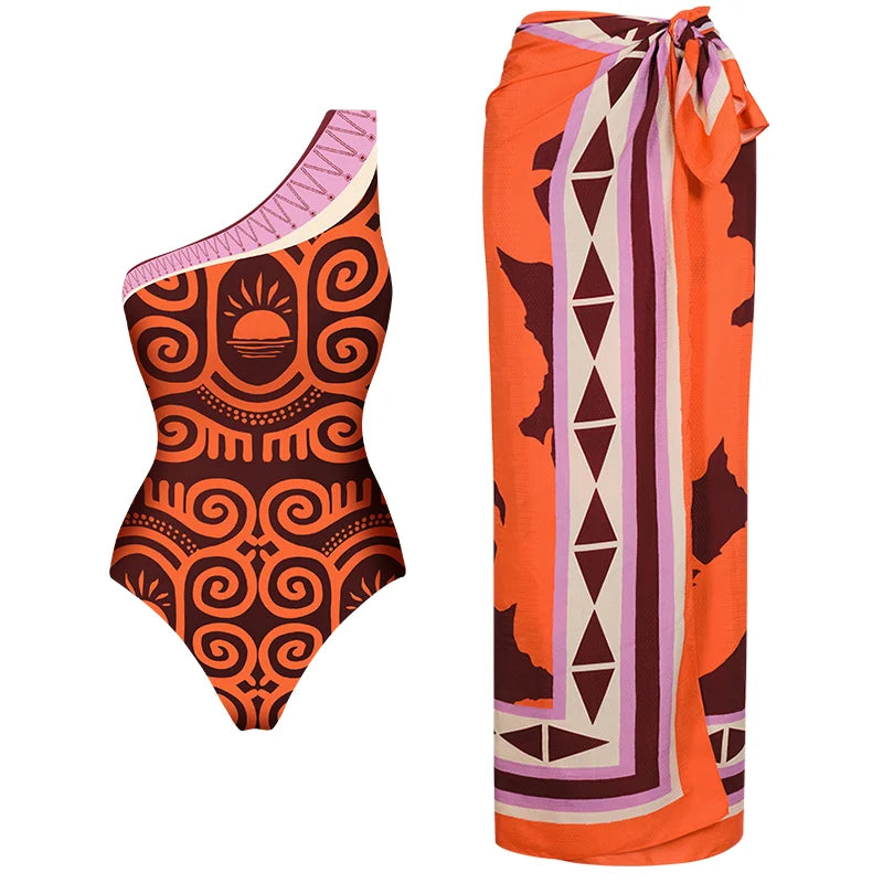 Modieuze badpak met één schouder en print of als set met sarong