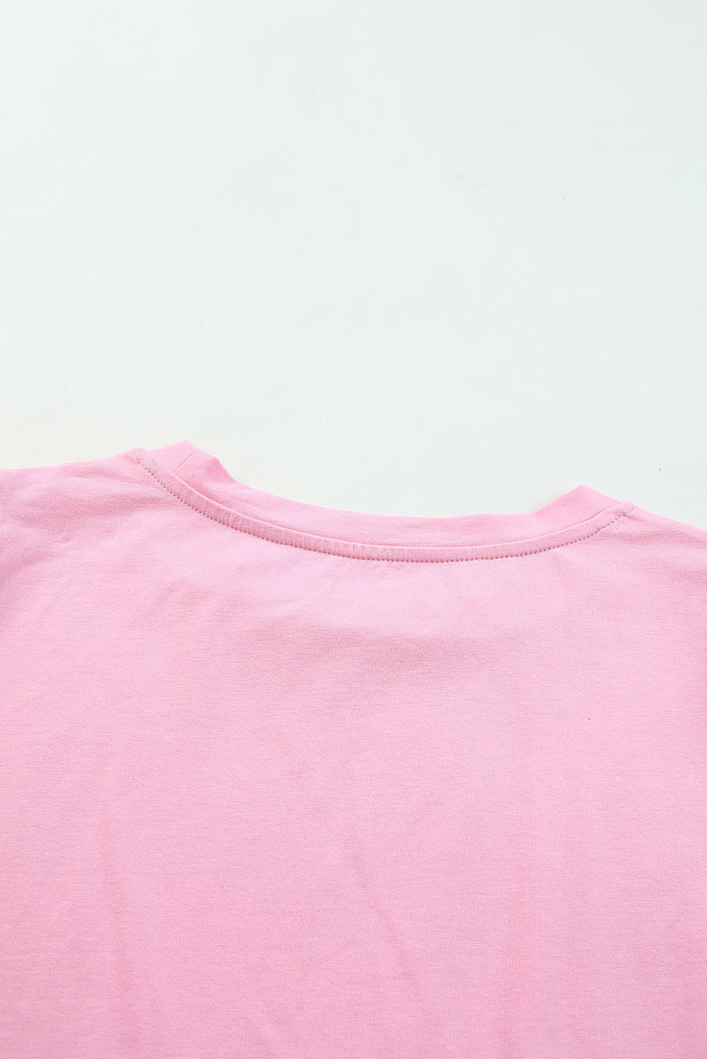 Roze top van tule met pofmouwen
