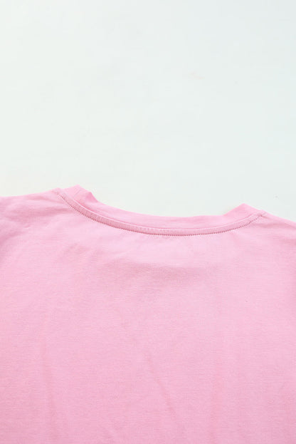 Roze top van tule met pofmouwen