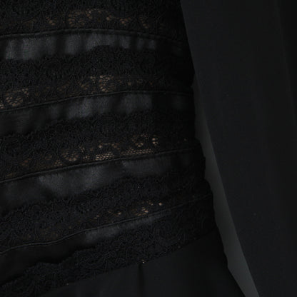 Sweet black long sleeved chiffon ruffle hem top