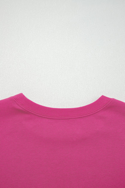 Preppy sweatshirt met strepen op de mouwen en een losse pasvorm