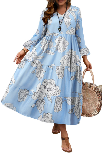 Hemelsblauwe maxi-jurk met bloemenprint wijde mouwen V-hals en ruches plus size