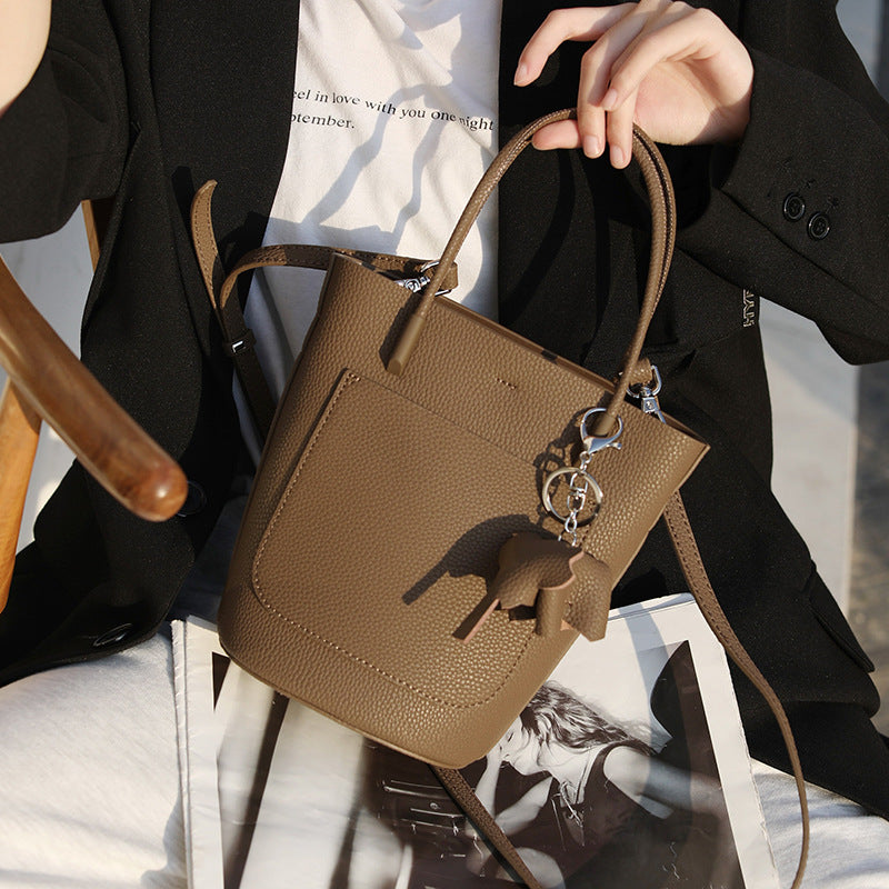 Koeienhuid Niche Design High-end Kleine Handtas