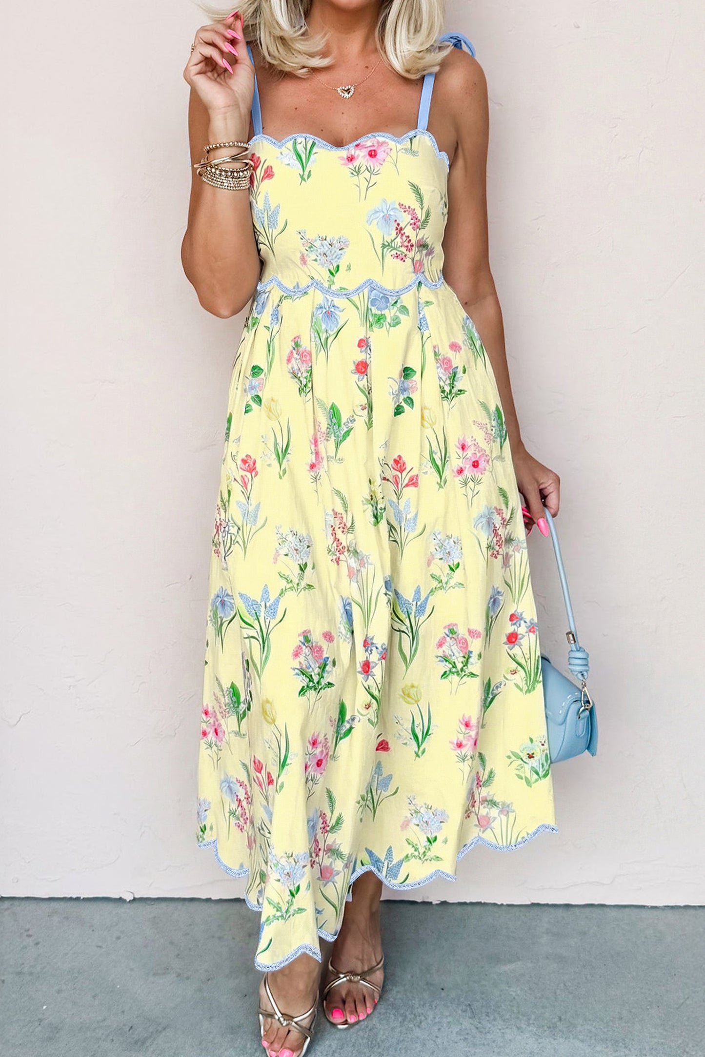 Roze midi-jurk met bloemenprint contrasterende bies strikbandjes en hoge taille