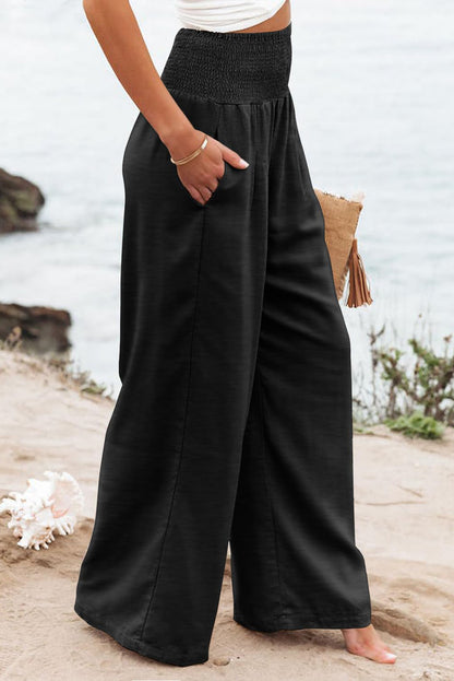 Zwarte geplooide broek met hoge taille en wijde pijpen plus size