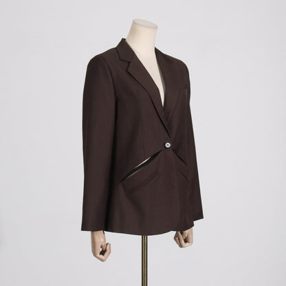 Effe kleur damesblazer met opengewerkte details