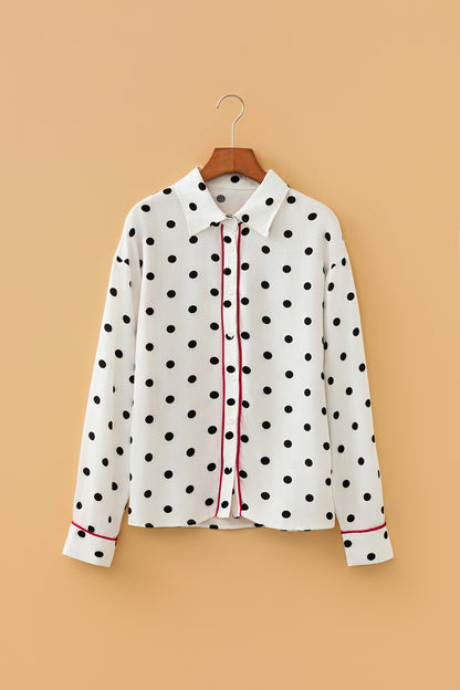 Elegante overhemd met witte stippenprint en contrasterende bies