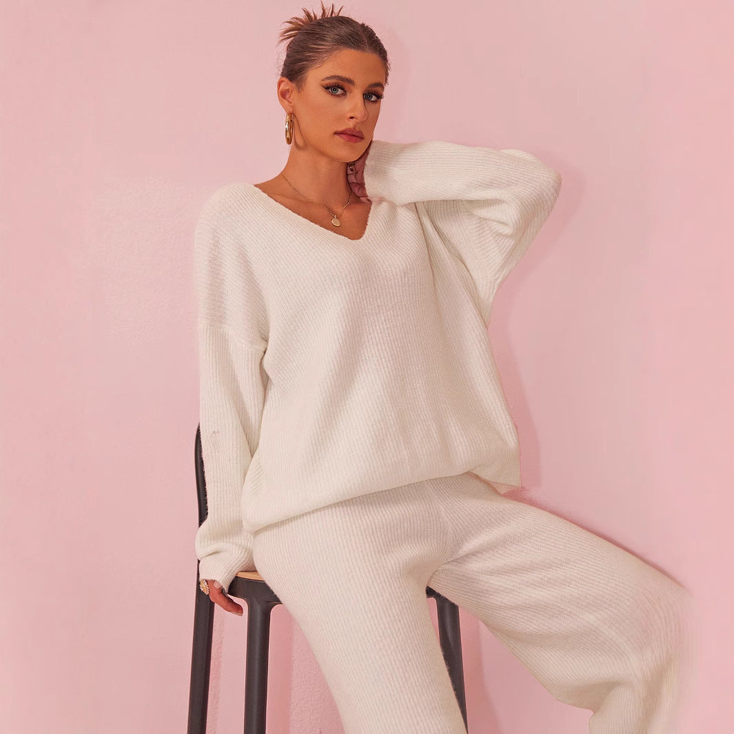 Gebreid geborsteld pak met lange mouwen en verzonken strepen