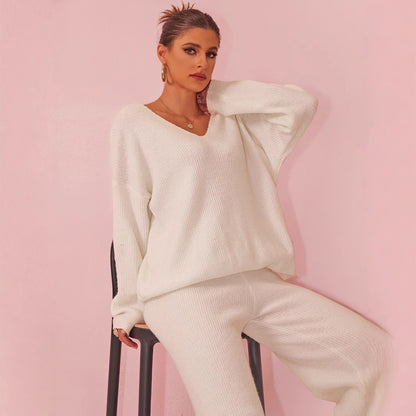 Gebreid geborsteld pak met lange mouwen en verzonken strepen