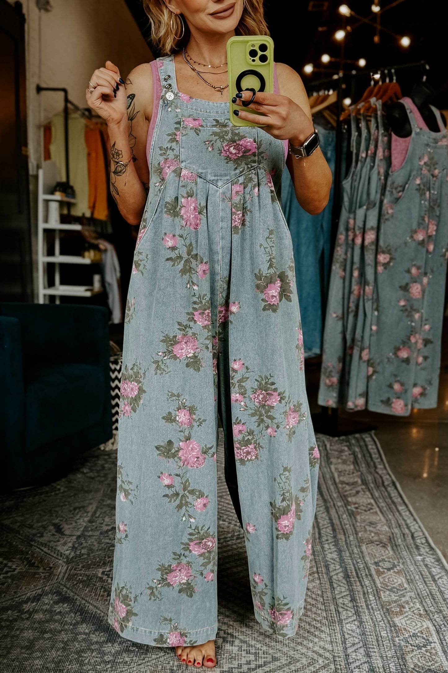 Jumpsuit van denim met bloemenprint zakken geplooide details hoge taille en wijde pijpen