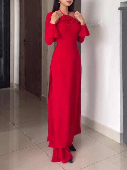 Driedelig rood geplooid halternek broekpak