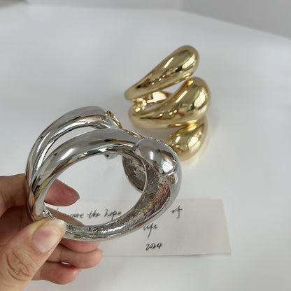 Geometrische high-end armband met spiraalvormige waterdruppelopening