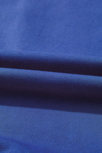 Preppy sweatshirt met strepen op de mouwen en een losse pasvorm