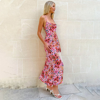 Elegante nauwsluitende cami jurk met een vrolijke print