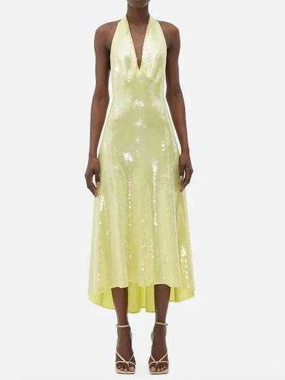 Dames mouwloze halterjurk in citroengeel met pailletten en lage open rug