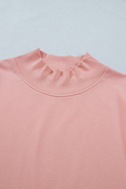Effen top met hoge hals en korte mouwen osvallend model
