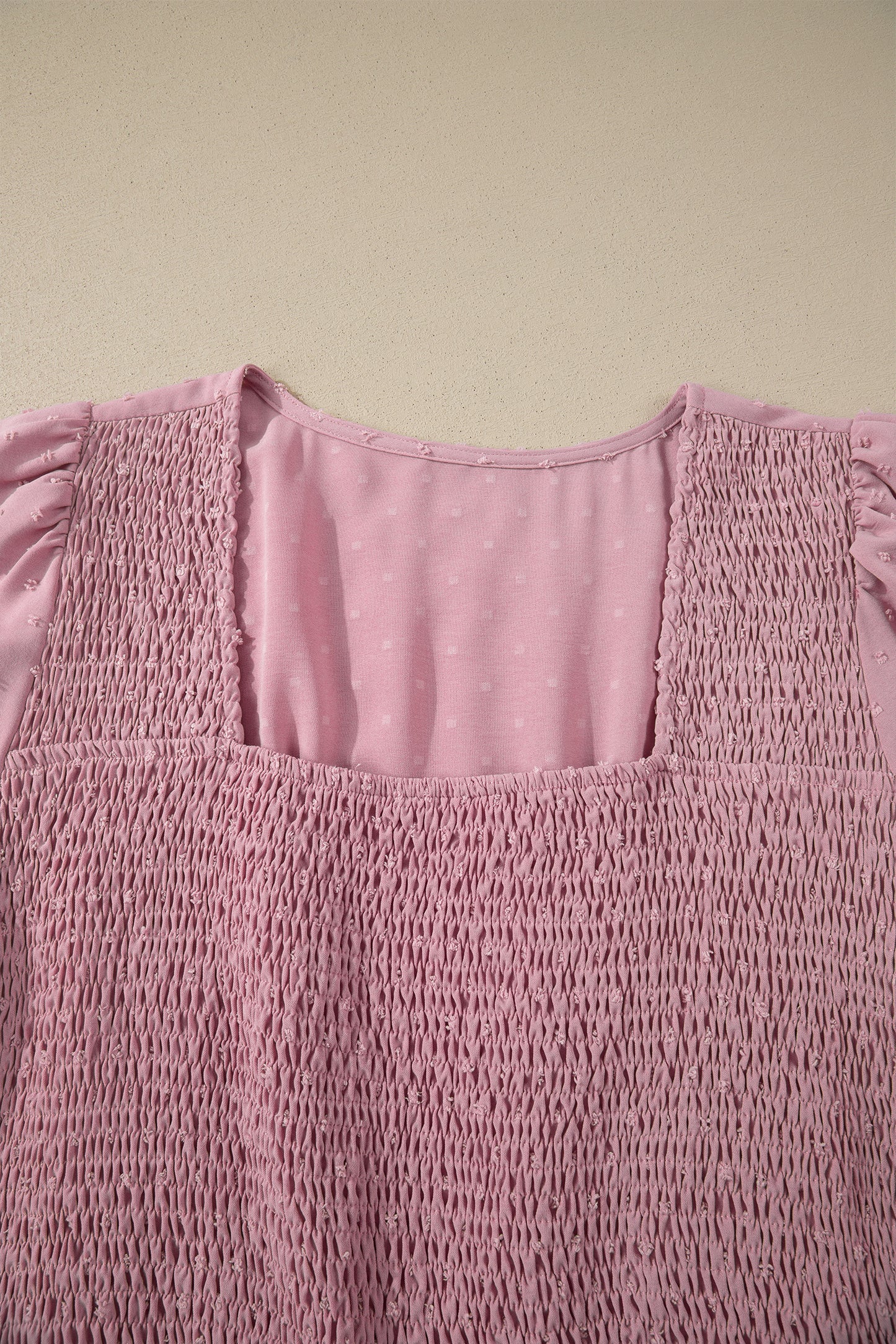 Roze plus size jurk met stippen korte mouwen smockwerk hoge taille en zwierige rok