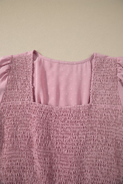 Roze plus size jurk met stippen korte mouwen smockwerk hoge taille en zwierige rok