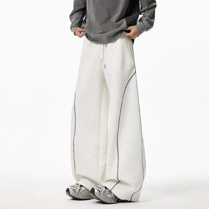Spring/Summer Oversized, Flowy Scimitar-Style Sweatpants with Streetwear-Inspired Relaxed Fit and Wide-Leg Design