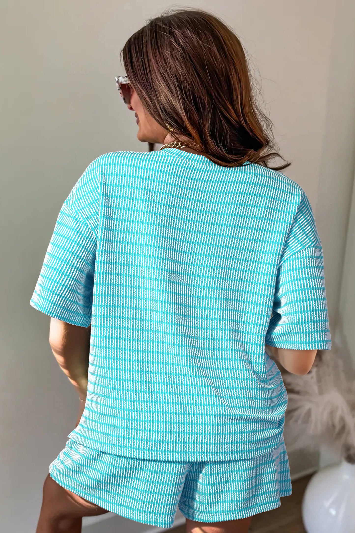 T-shirt met opstaande ribbels los model en shorts met trekkoord in de taille 2-delige set