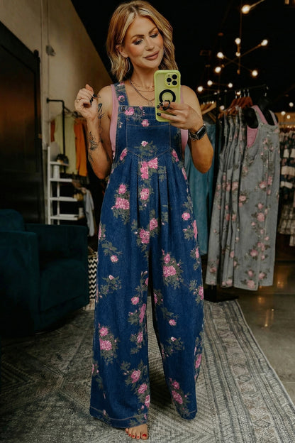 Jumpsuit van denim met bloemenprint zakken geplooide details hoge taille en wijde pijpen