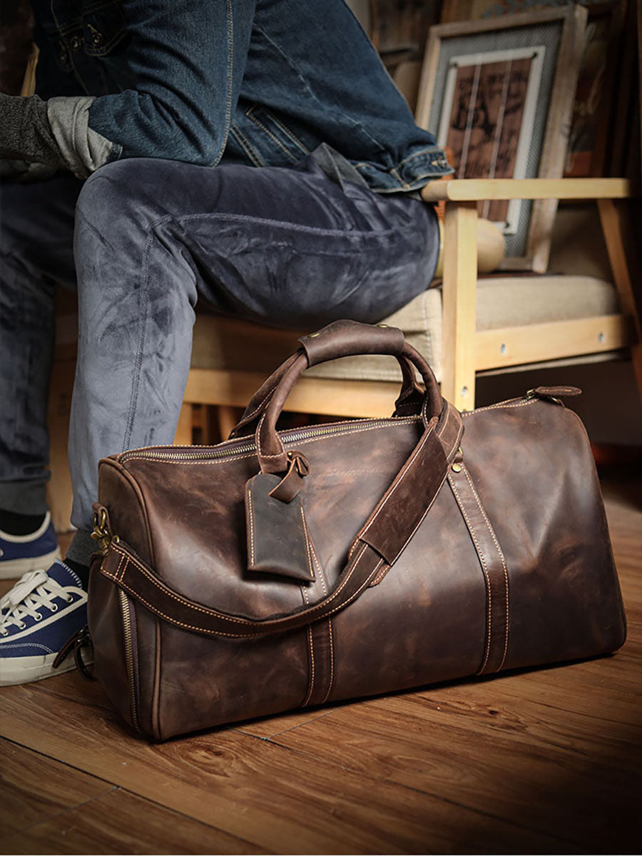 A men's hand-held outdoor camping travel bag made of cowhide
