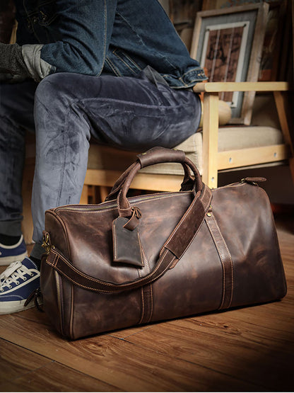 A men's hand-held outdoor camping travel bag made of cowhide