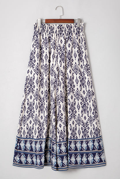 Blauwe broek met etnische print hoge taille en wijde pijpen losse pasvorm