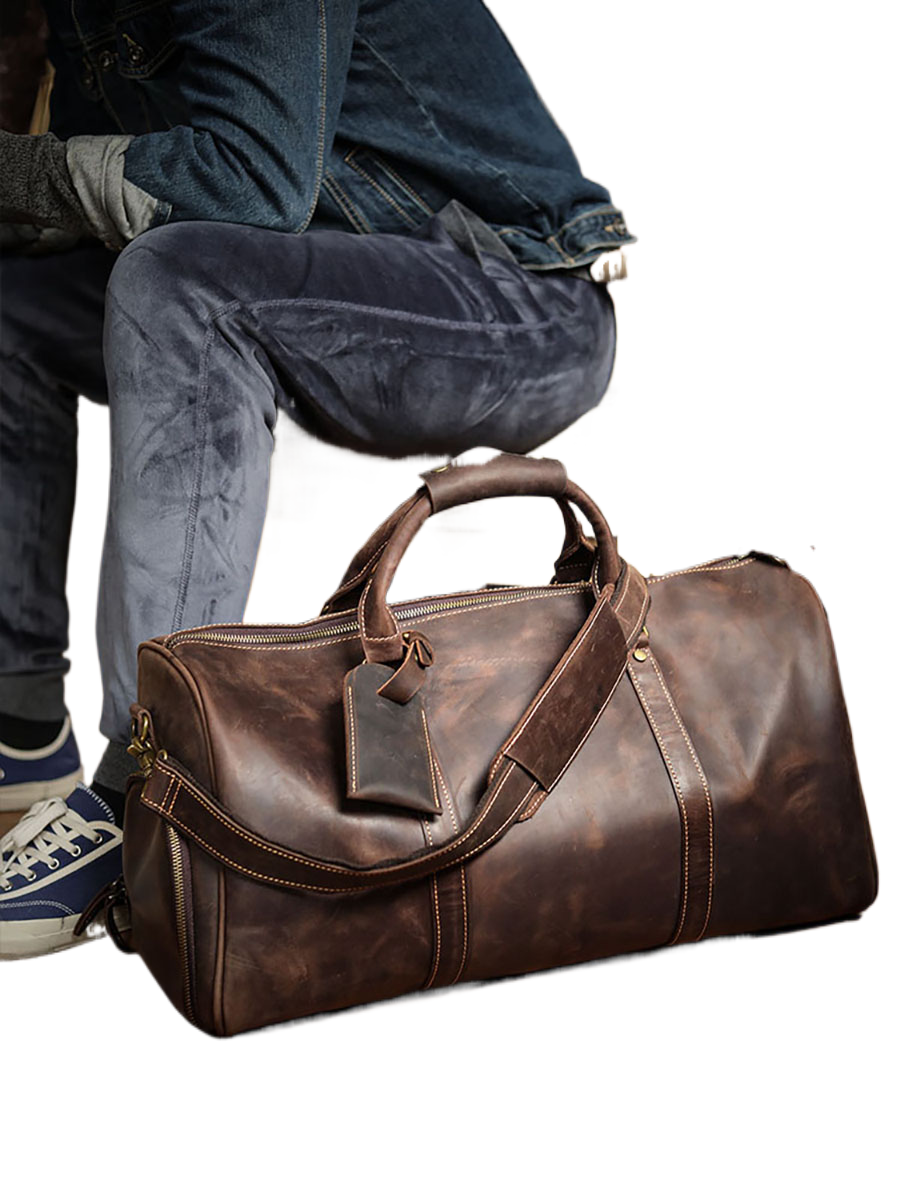 A men's hand-held outdoor camping travel bag made of cowhide