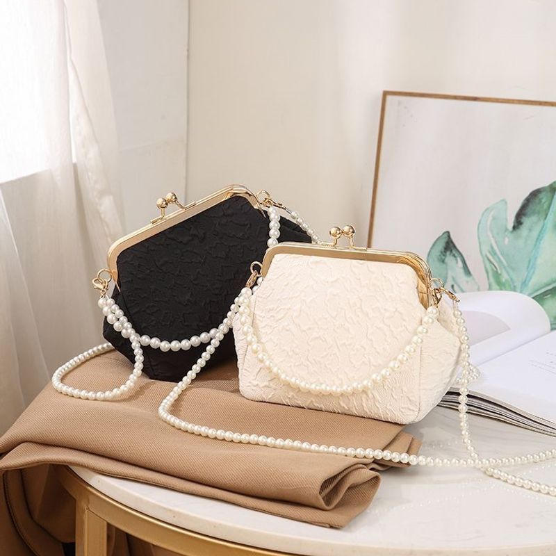 Mini shell-shaped jewelry charm handbag made