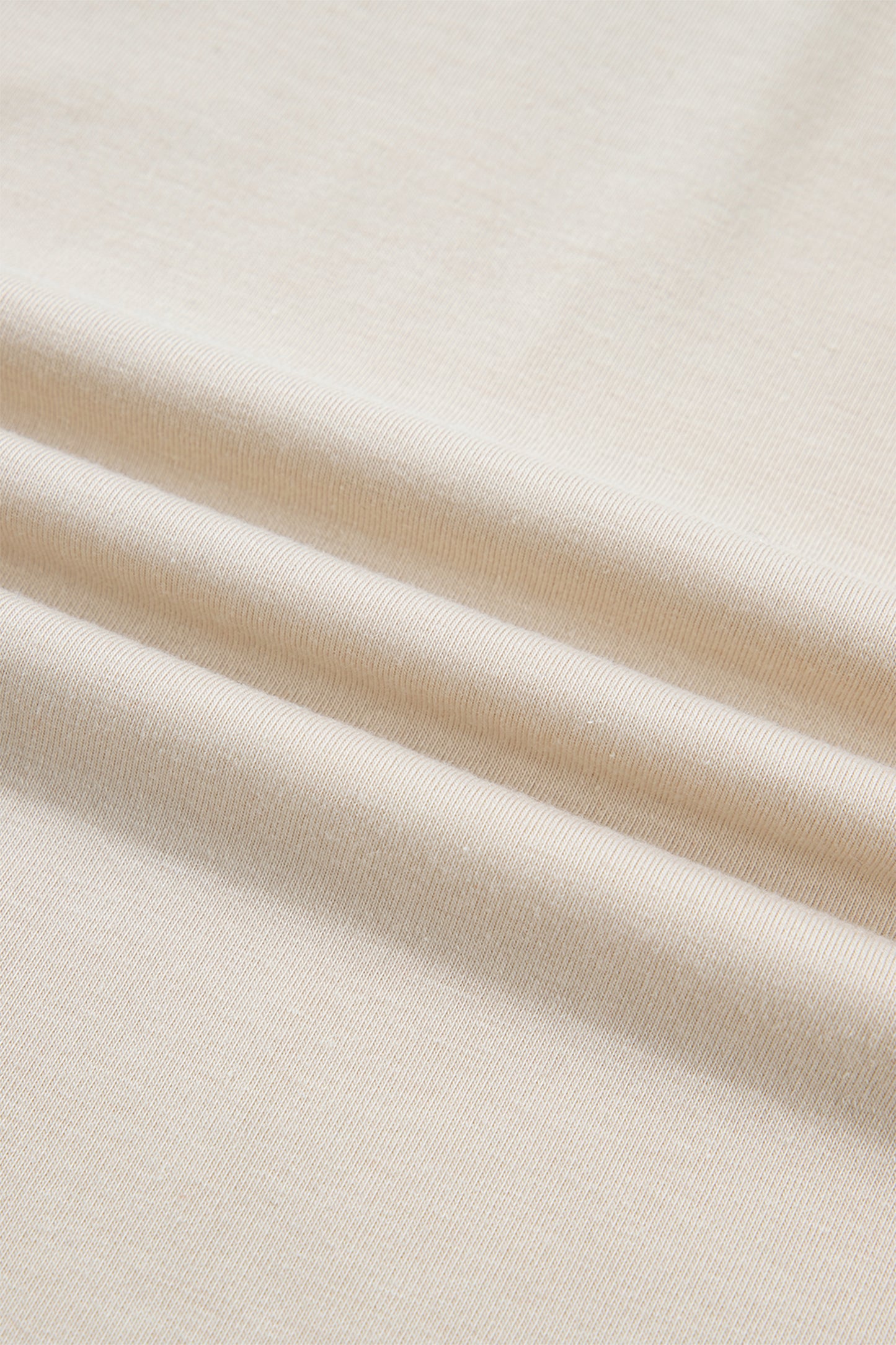 Abrikooskleurige kanten V-hals trui met lange mouwen en patchwork-effect