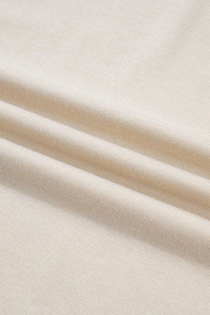 Abrikooskleurige kanten V-hals trui met lange mouwen en patchwork-effect