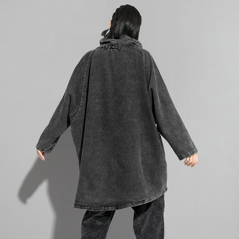 Zwarte denim sweater met onregelmatige snit