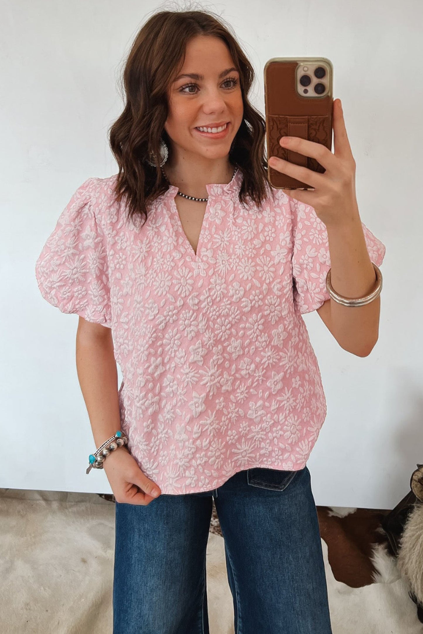 Blouse met pofmouwen en bloemenprint in abrikoosroze jacquardstof