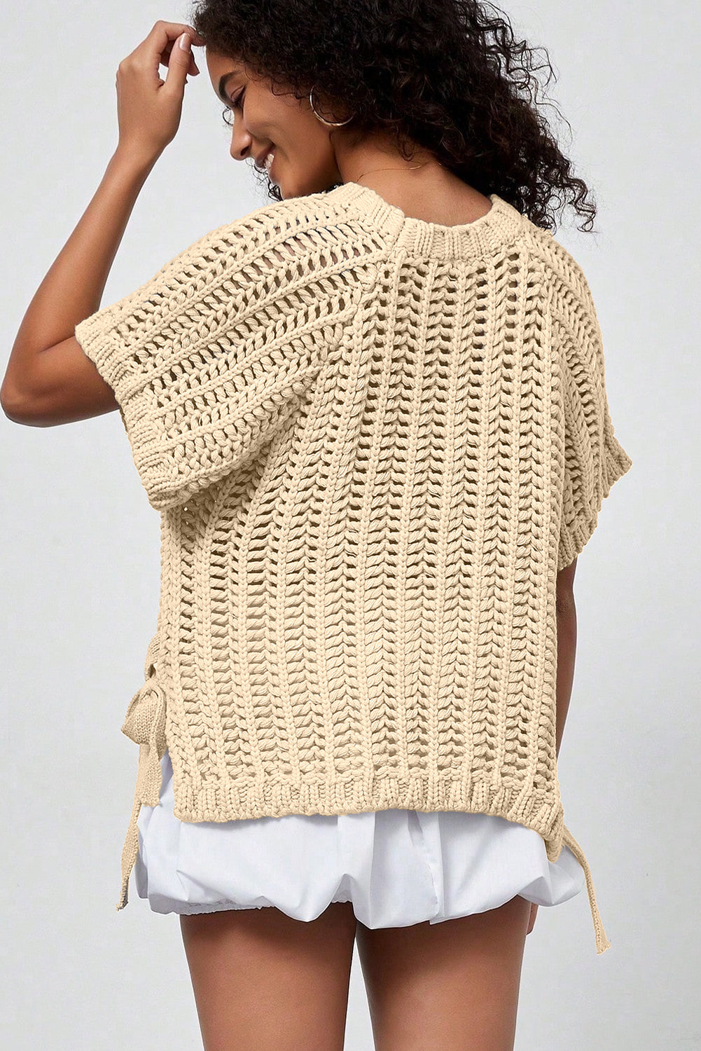 Plus size open gebreide trui met strik en korte mouwen