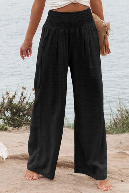Zwarte geplooide broek met hoge taille en wijde pijpen plus size