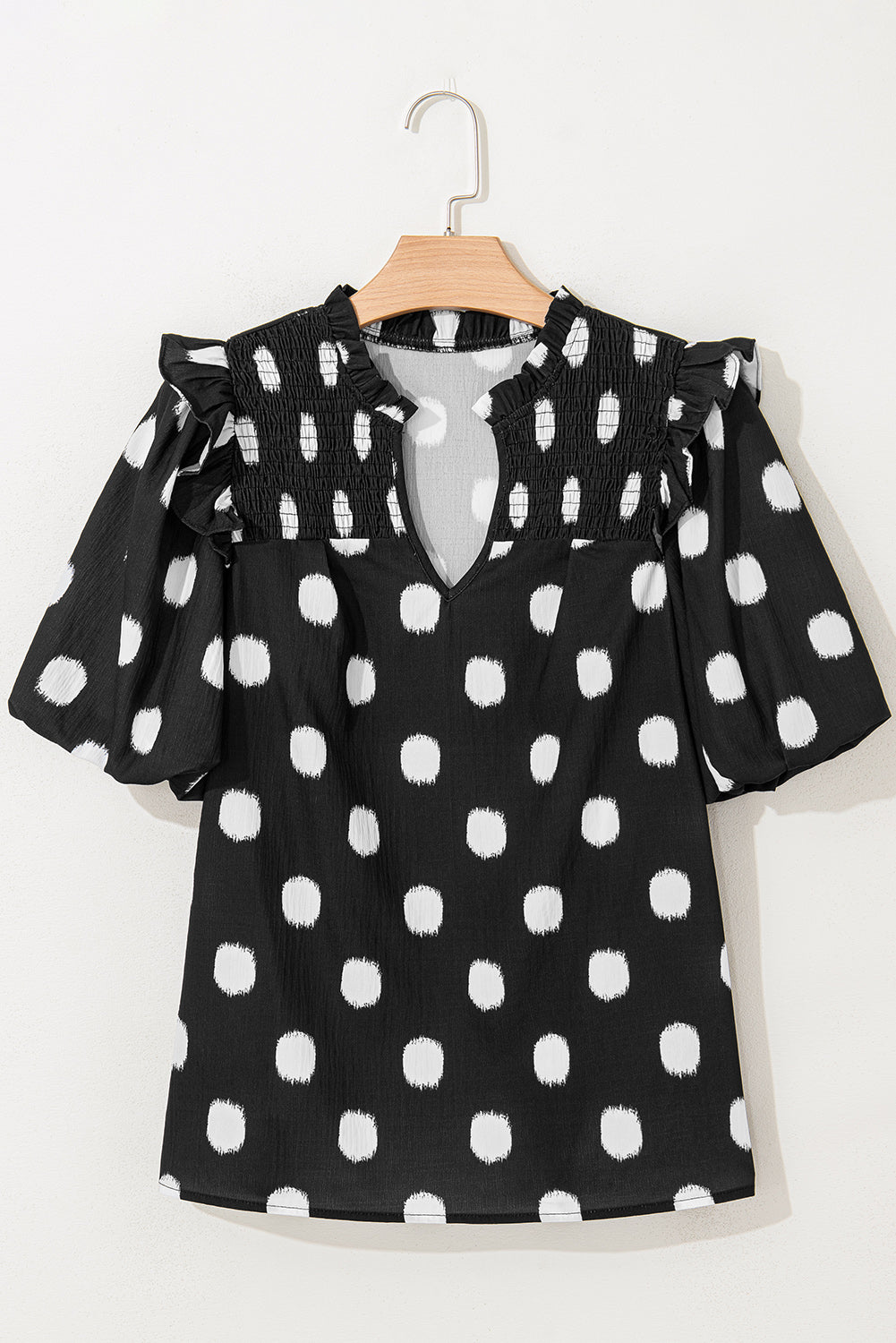 Blouse met stippenprint gesmokte halslijn en korte ballonmouwen