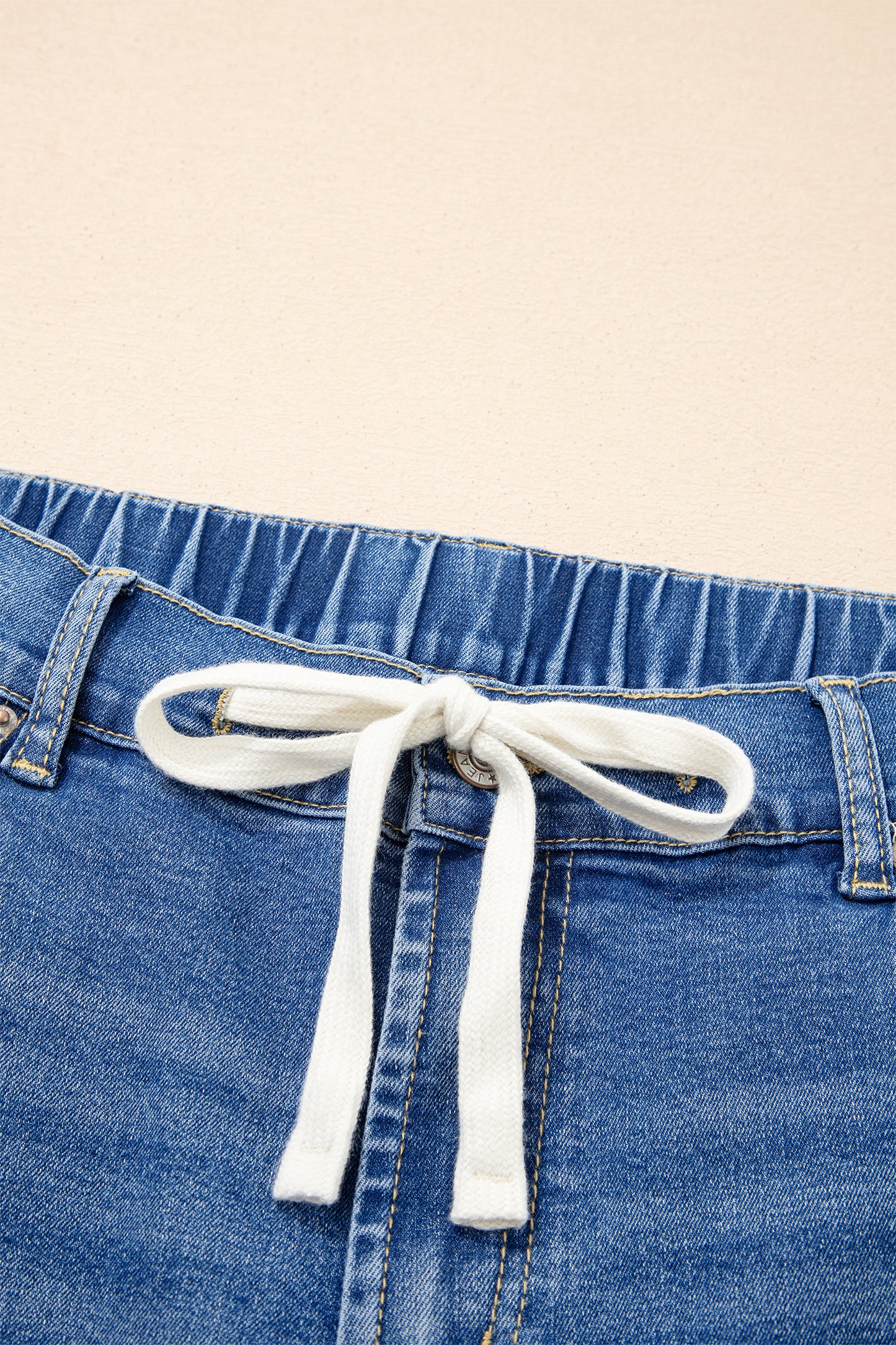 Jeans met acid wash-effect en vetersluiting plus size