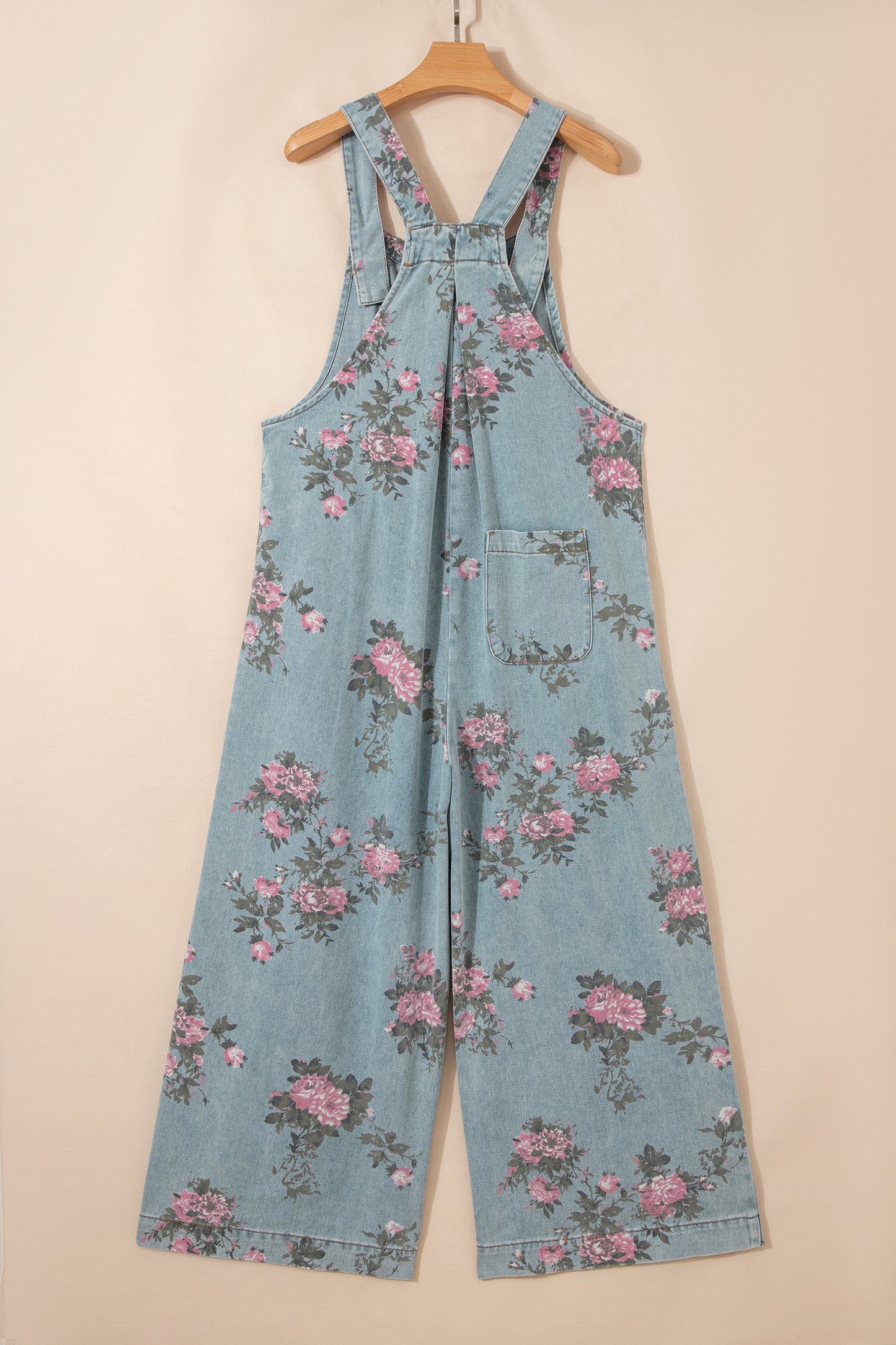 Jumpsuit van denim met bloemenprint zakken geplooide details hoge taille en wijde pijpen