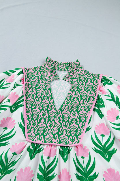 Blouse met veelkleurige bloemenprint pofmouwen contrasterende boord en V-hals