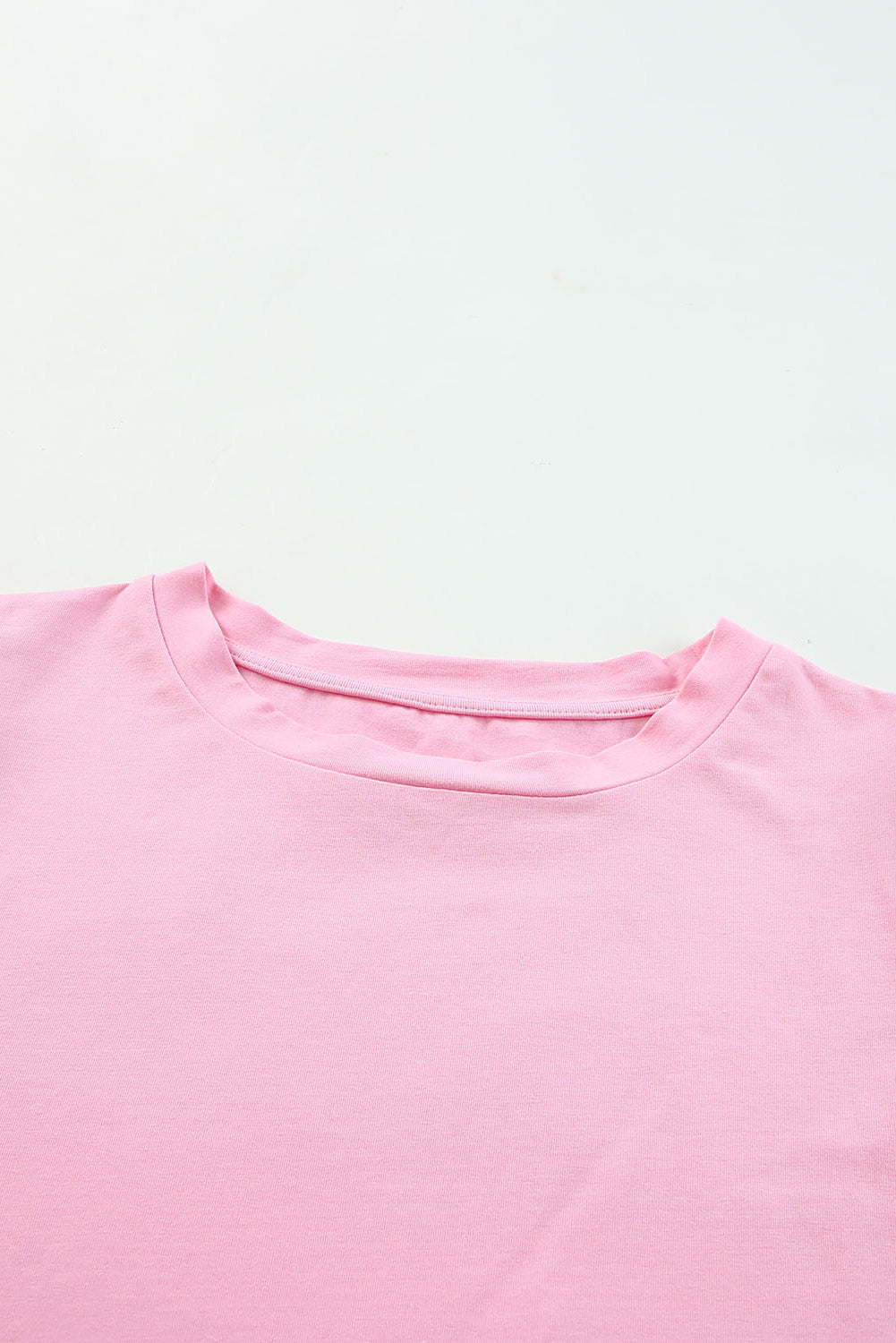 Roze top van tule met pofmouwen