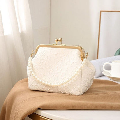 Mini shell-shaped jewelry charm handbag made