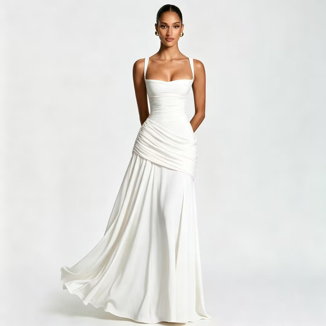 Elegante mouwloze jurk met plooien en wijde rok