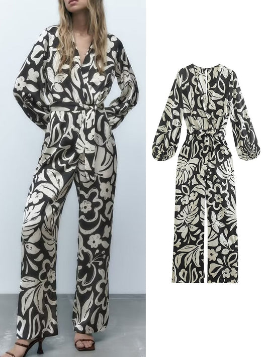 Modieuze geprinte damesjumpsuit  met ritssluiting en riem
