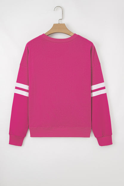 Preppy sweatshirt met strepen op de mouwen en een losse pasvorm