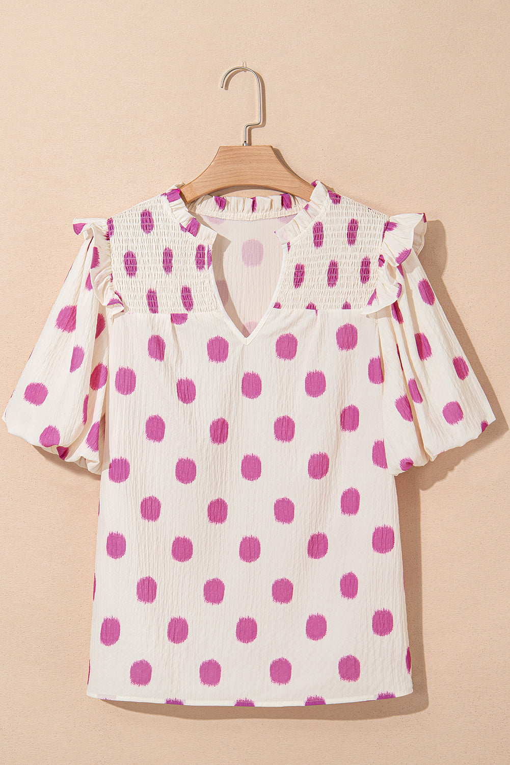 Blouse met stippenprint gesmokte halslijn en korte ballonmouwen