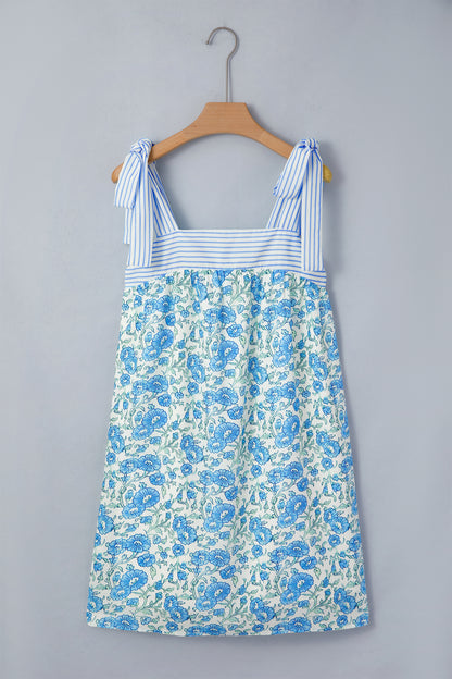 Mini-jurk met bloemenprint strepen patchwork en strikbandjes