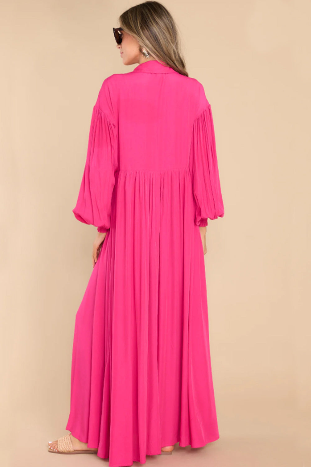 Roze maxi-jurk met ballonmouwen