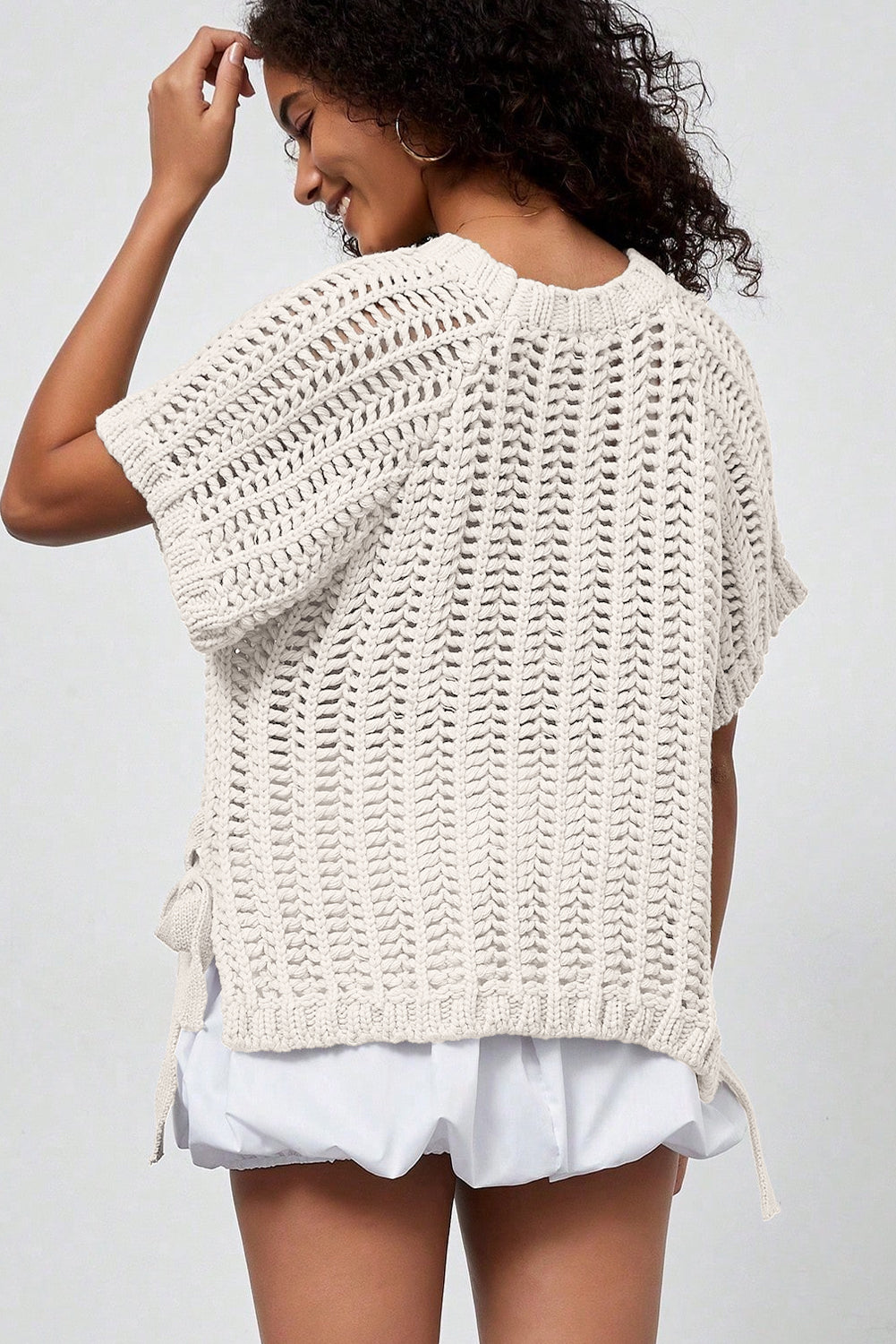 Plus size open gebreide trui met strik en korte mouwen