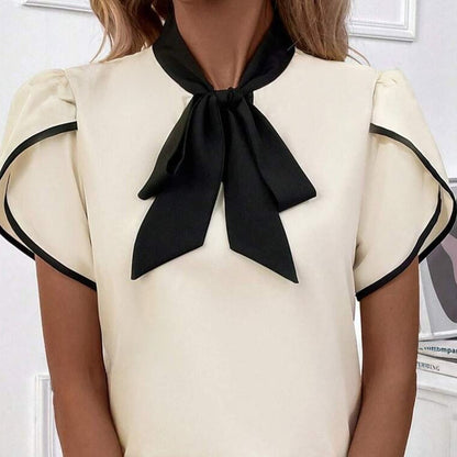 Witte blouse met knoophals